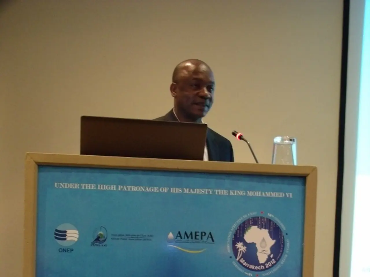 In this image, we can see a banner. In the banner, we can see some figures and text. Here we can...