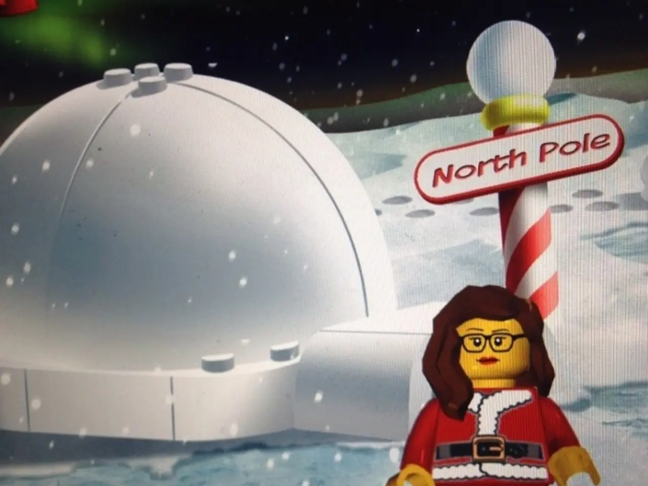 This is an animation and here we can see images of an igloo, a pole and a toy and we can see snow...