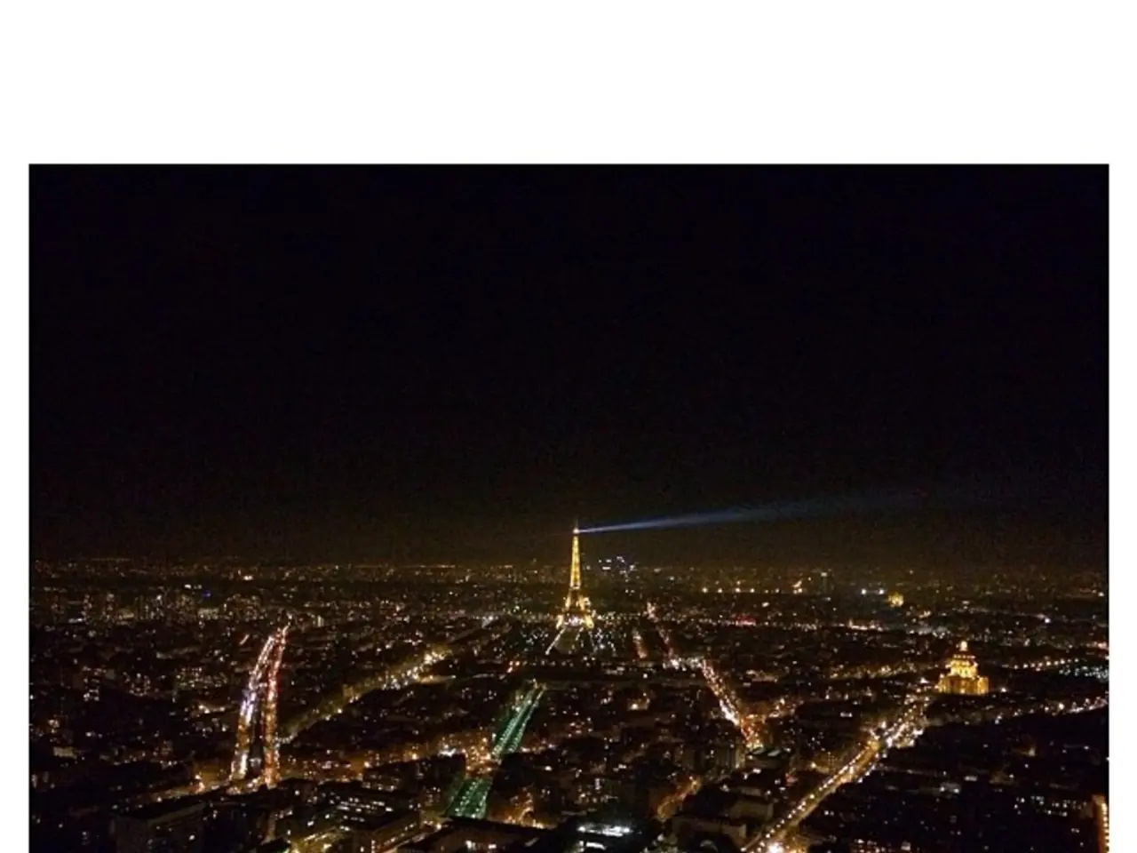 In the picture I can see few buildings which has few lights on it.