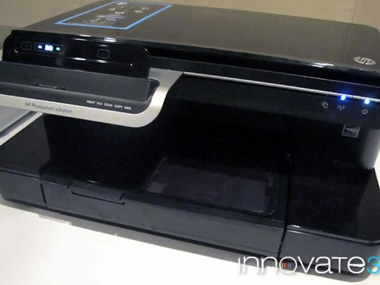 In this image we can see a printer.