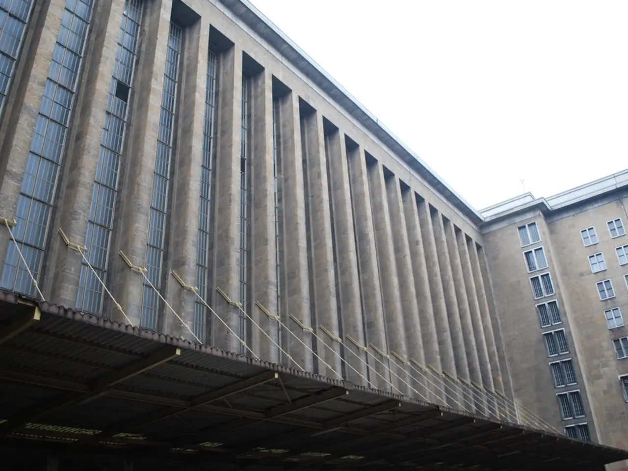 In this picture there is a building which is in brown color.